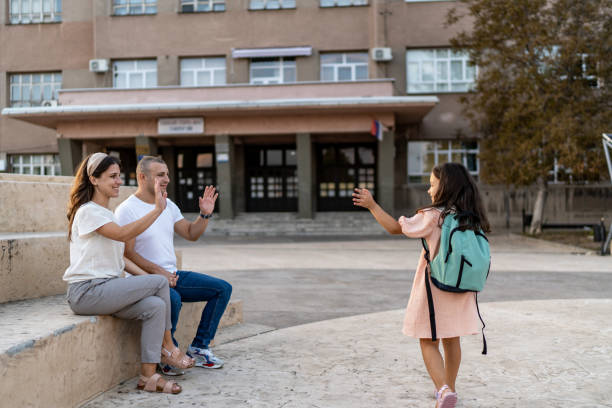 istock Parents accompanies daughter to school 2158093315