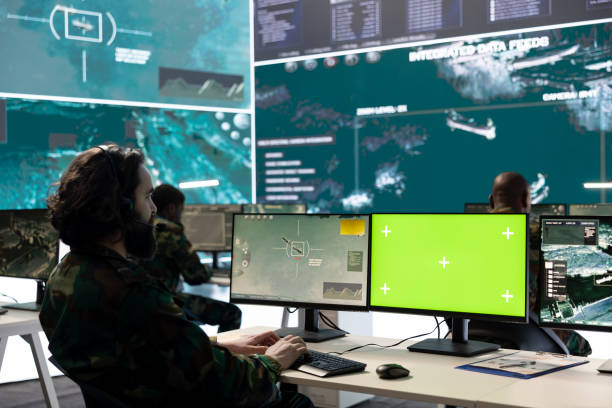 istock Professional IT engineer looks at surveillance footage and isolated mockup 2158097125