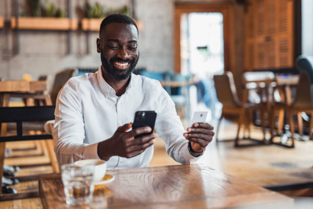 istock Modern businessman shopping online using mobile phone 2158103049