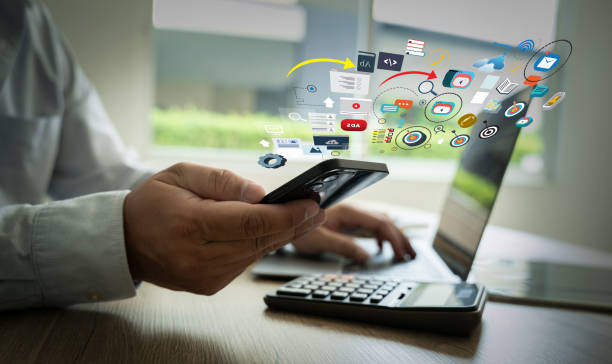 istock DIGITAL MARKETING new startup project MILLENNIALS Business team hands at work with financial reports and a laptop 2158106334