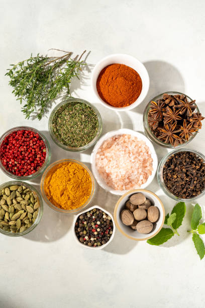 istock Spices and herbs in bowls, top view 2158106655