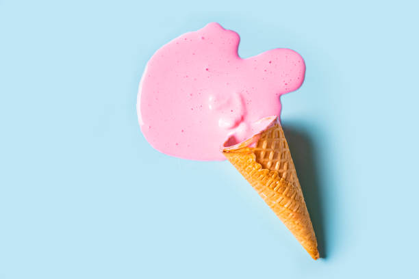 istock wafer cone with melted pink ice cream 2158108085