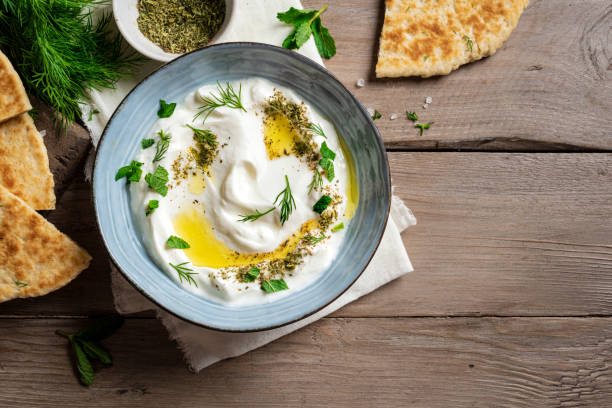 istock Labneh yogurt cream cheese dip with pita bread 2158108942