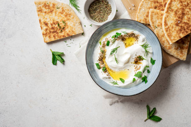 istock Labneh yogurt cream cheese dip with pita bread 2158108973