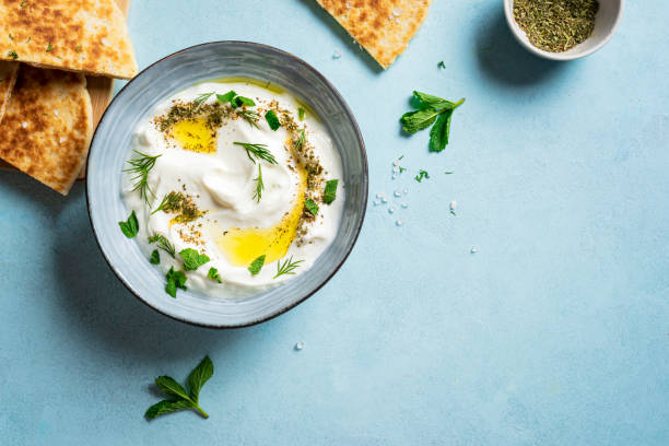 istock Labneh yogurt cream cheese dip with pita bread 2158109051