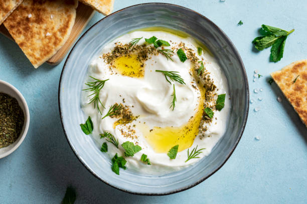 istock Labneh yogurt cream cheese dip with pita bread 2158109092