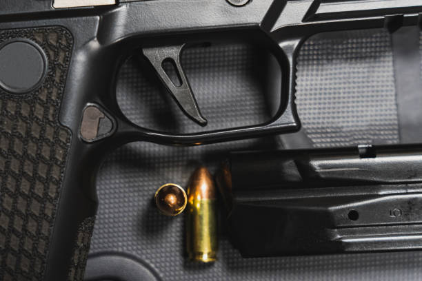 istock Firearm, trigger, pistol, magazine and 9mm cartridge. 2158110252