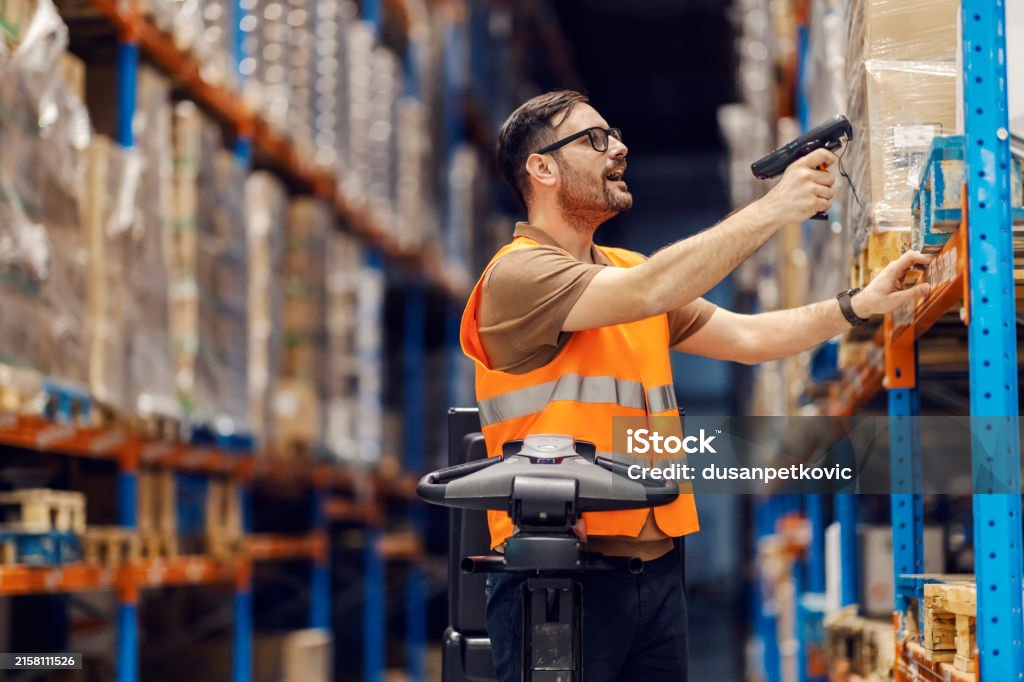 Loading Representative A Distribution Center Manager Is Loading Goods With Bar Code Reader ...