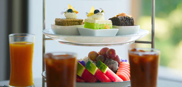 istock close up of afternoon tea cake and fruit 2158113149