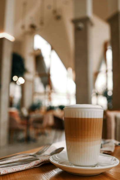Cup of latte in a restaurant, good morning