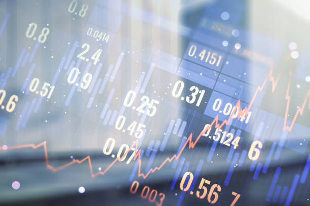 istock Abstract virtual financial graph hologram on blurry modern office building background, forex and investment concept. Multiexposure 2158117583