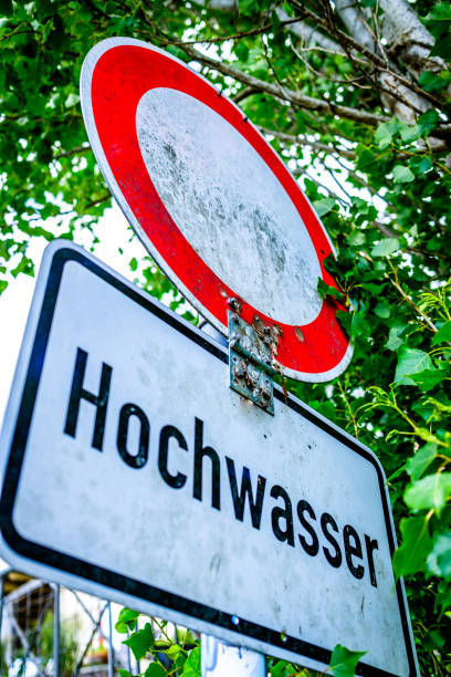 istock typical highwater sign in germany - translation: high water 2158117605