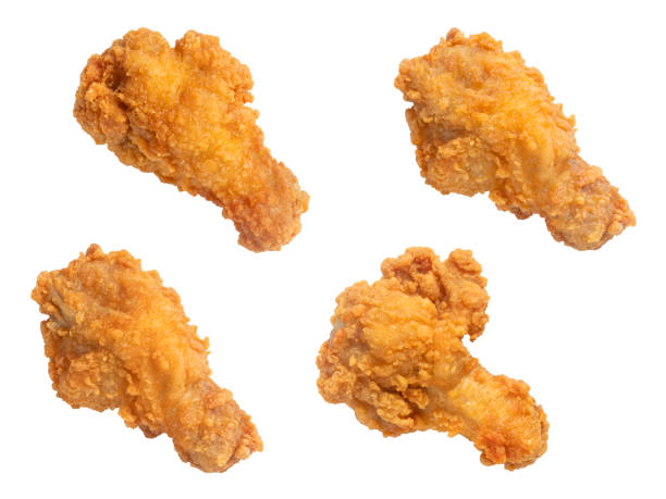 istock Set of fried chicken drumsticks isolated on white background 2158118075