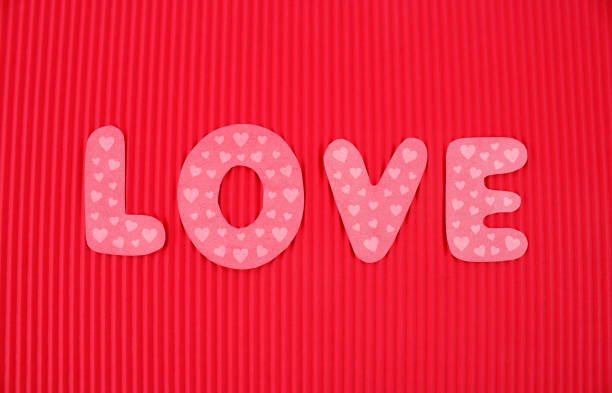 Word love with many hearts