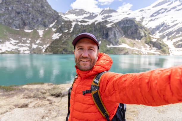 istock Adventurous Hiker Capturing a Selfie Amidst a Scenic Mountain Trek 2158118693