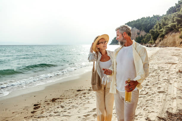istock Mature couple enjoying day on a beach 2158120541