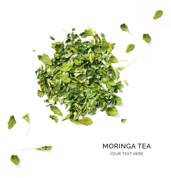 istock Creative layout made moringa leaves  on white background. Flat lay. Food concept. 2158122078