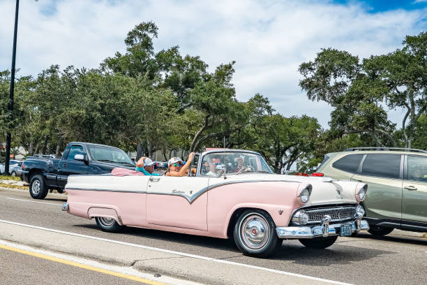 Gulfport, MS - October 07, 2023: Wide angle front corner view of a 1955 Ford Fairlane Sunliner Convertible at a local car show.