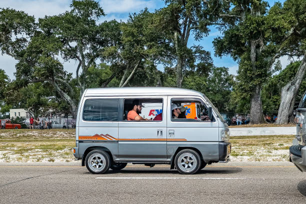 Gulfport, MS - October 07, 2023: Wide angle side view of a 1997 Honda Acty Street V Van  at a local car show.