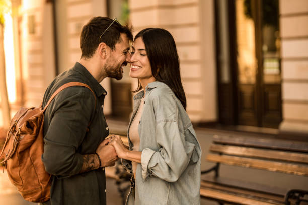 istock Happy young couple bonding while having fun exploring the city. 2158123055