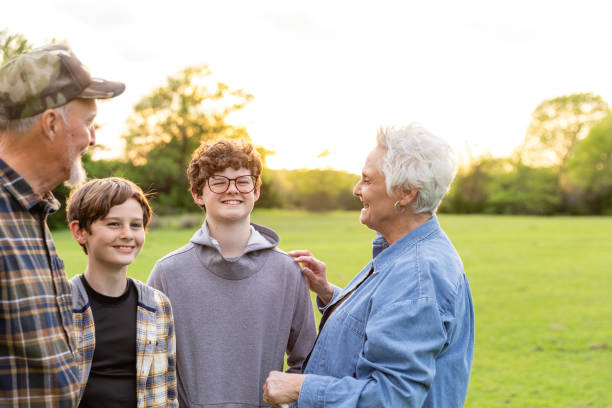 istock Senior grandparents and grandsons laugh and talk 2158124211