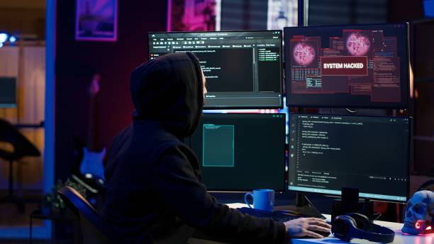 istock Frustrated scammer upset after written malicious code proves to be unsuccessful 2158125120