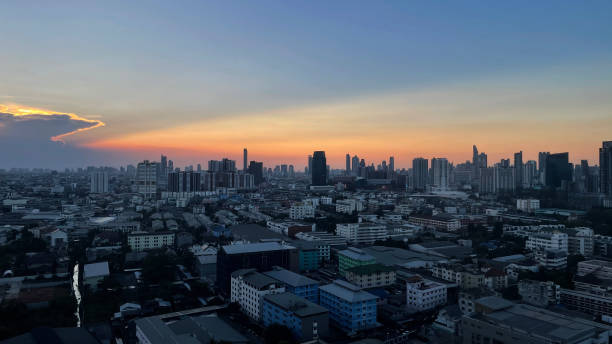 istock Sunset With Cityscape, Sunlight, Cityscape, Copy space 2158125412
