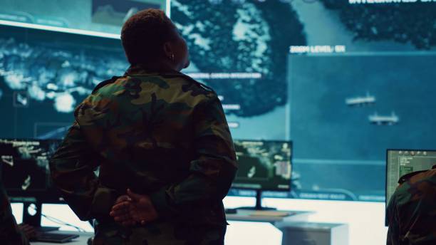 istock Female technical sergeant monitoring air traffic to detect any enemy aircraft 2158125499