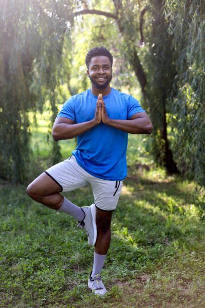 istock Young man exercising his balance 2158127274