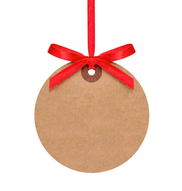 istock Round paper tag with red bow isolated on white 2158127347