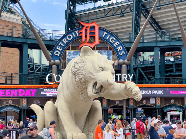 People Entrance Baseball Stadium Detroit, USA - June 14, 2024: People by decorative statues of Tigers in Comerica Park, the baseball stadium for the Detroit Tigers MBL team. comerica park photos stock pictures, royalty-free photos & images
