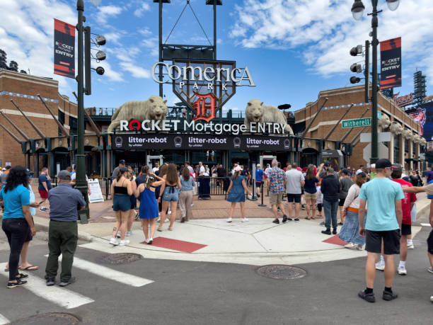 People Entrance Baseball Stadium Detroit, USA - June 14, 2024: People by decorative statues of Tigers in Comerica Park, the baseball stadium for the Detroit Tigers MBL team. comerica park photos stock pictures, royalty-free photos & images