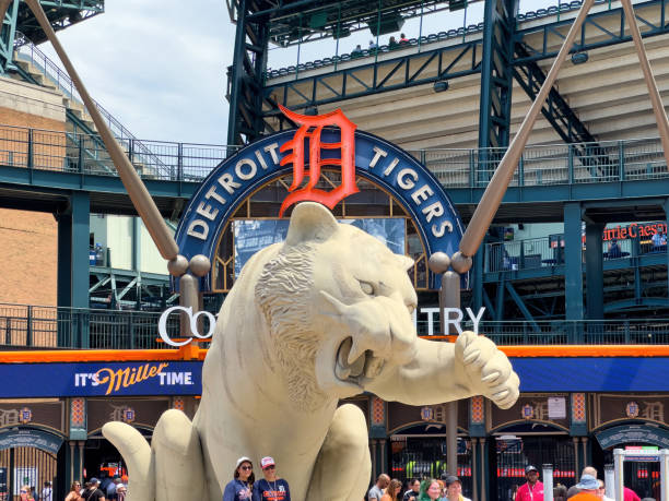 People Entrance Baseball Stadium Detroit, USA - June 14, 2024: People by decorative statues of Tigers in Comerica Park, the baseball stadium for the Detroit Tigers MBL team. comerica park photos stock pictures, royalty-free photos & images