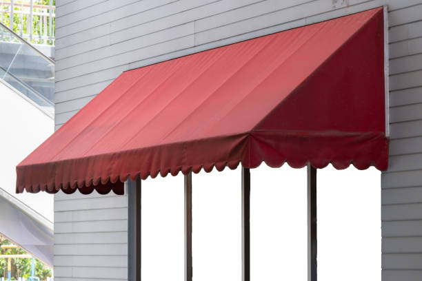 istock A red awning with white trim is hanging over a window 2158128857