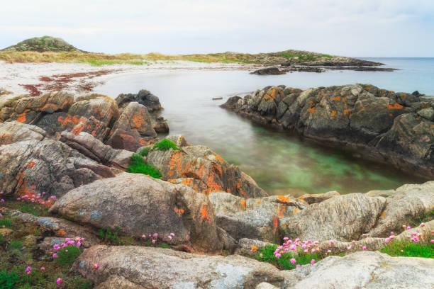 Rocky shore on Lista beach, Norway.