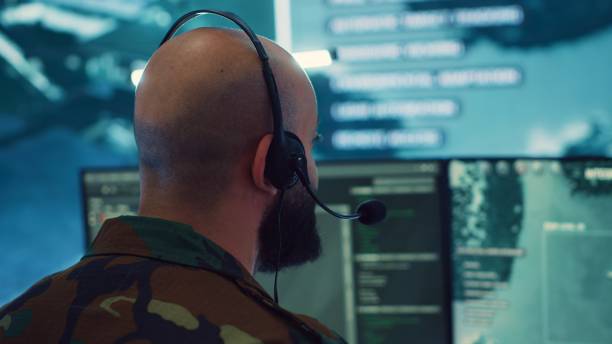 istock Military operator transmitting gps coordinates of hostile ships to national guard 2158130878