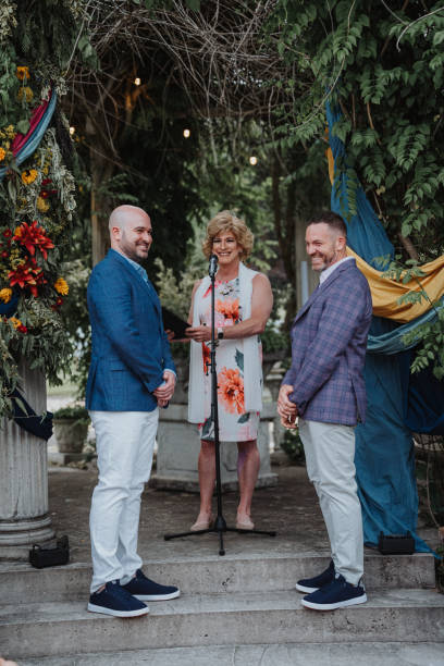 istock Drag queen officiating wedding for gay friends 2158131102