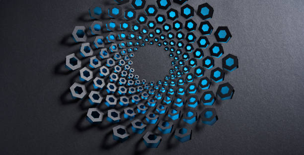 Native image size: 10408 x 5304. A captivating piece of cut paper artwork featuring an array of blue and black hexagons arranged in a dynamic spiral pattern on a dark background. The meticulous arrangement and precise cuts create a three-dimensional effect, adding depth and shadow to the design. This piece showcases the artist's skill in combining geometry and color to produce a visually striking and intricate composition.