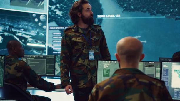 istock Staff sergeant providing mission files to brief his operational crew 2158132326