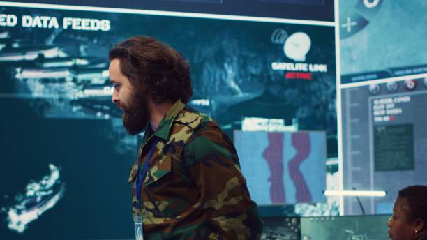 istock Staff sergeant briefing his army troops crew with details of a new mission 2158132423