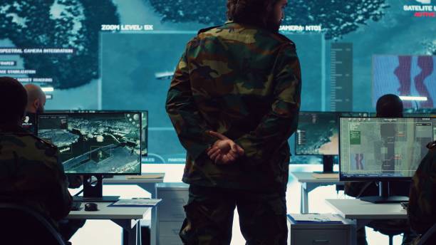 istock Colonel overseeing special operation to gather intelligence in control center 2158132457
