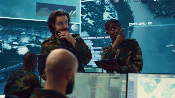 istock Diverse team of infantry unit leader and commander gather intelligence 2158134784