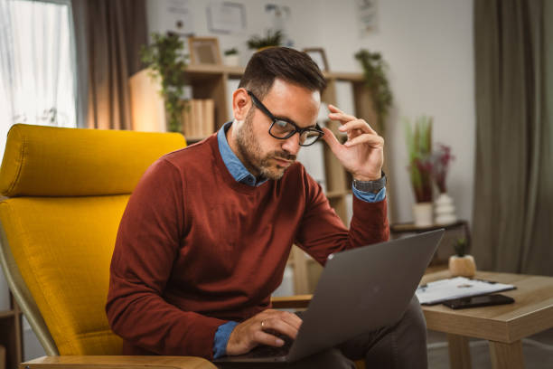 istock Adult exhausted man man work from home and have dilemma about work 2158134818