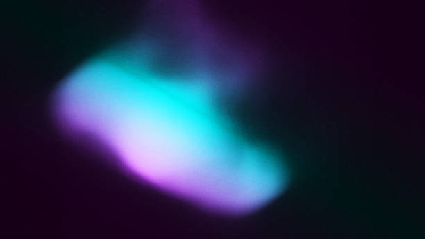 istock Abstract Organic Color Gradient on Grainy Noise Black Background 2158136456