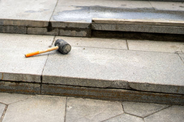 istock rubber mallet lies on granite tiles, a tool essential for precise stairway repair work 2158139528