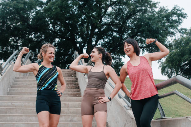 istock Morning Women's Running Group Flex Arms 2158141364