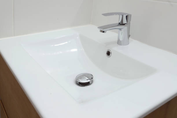 istock square white washbasin in small bathroom design 2158141733