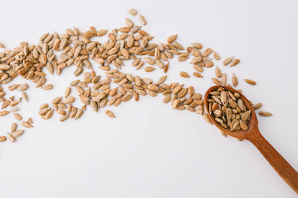 istock Background of peeled sunflower seeds 2158142629