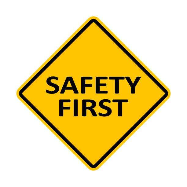 istock Sign SAFETY FIRST. The need to comply with safety measures. Drivers should be more attentive and careful. Diamond road sign. Rhombus road sign. Warning yellow road sign. 2158143596