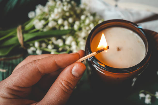 istock Girl lights a candle, spring aesthetics 2158145130